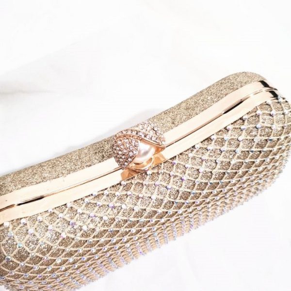 gold evening bag with mesh design on one side and glitter design on the other