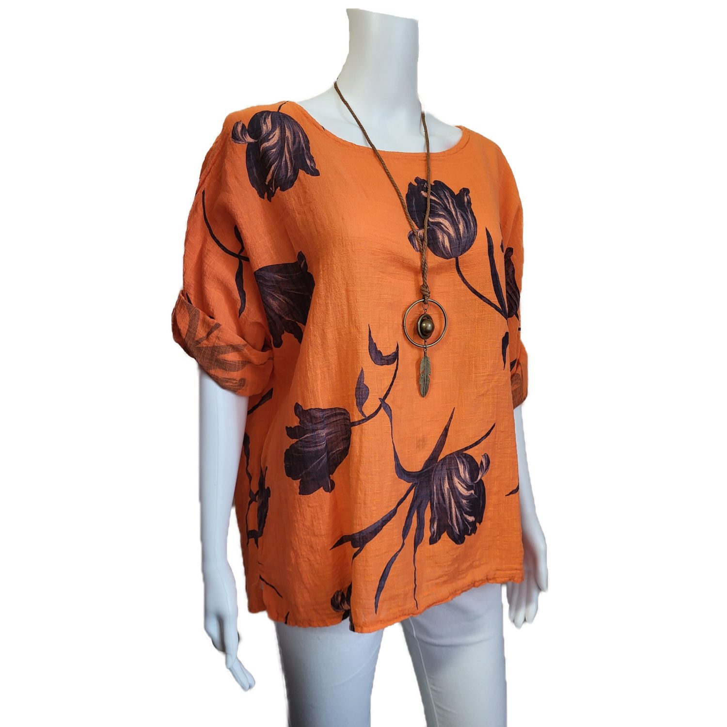 orange top with navy floral pattern adn free necklace