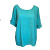turquoise top with scoop neck and 3/4/ sleeves