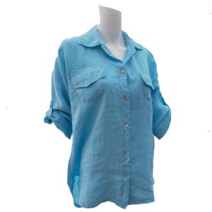 pale blue shirt with breast pockets and turned up sleeeves