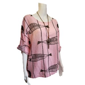 pale pink top with large fish design