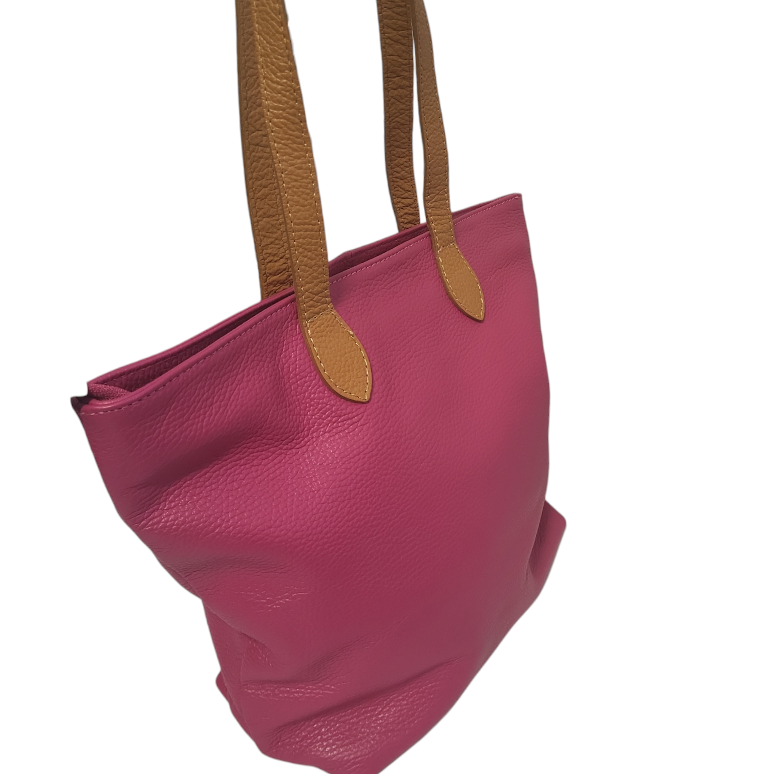 Bright pink leather bag with 2 brown handles side view