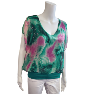 green and pink silky top with v neck and short sleeves. silky feel