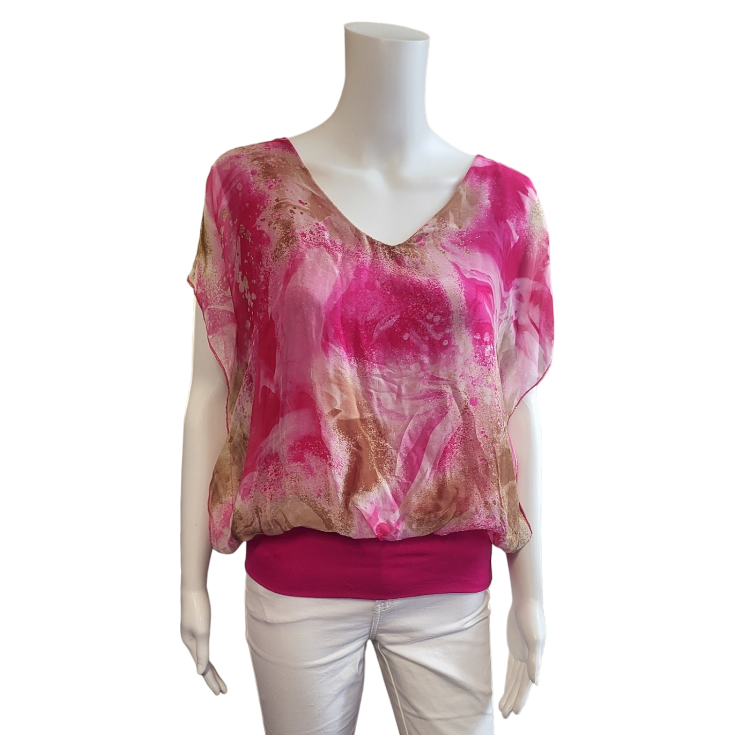 pink and beigs silky top wiht v neck and stretchy vest that shows beneath the blouse
