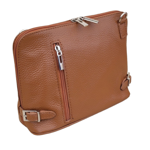 Tan brown leather messenger bag with vertical zip and strap details.