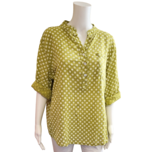 lime green shirt with white polka dots, grandad collar and breast pocket. turned up sleves